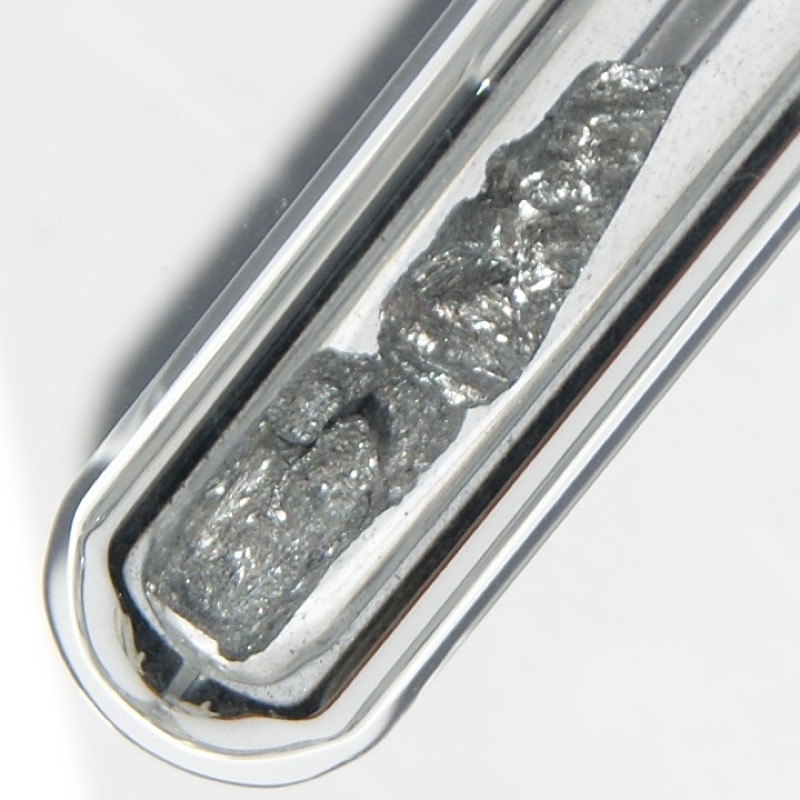 Arsenic — Ultrapure Metallic Arsenic under Argon, 1 - 2 grams. Original size of each piece in cm: 0.5 x 1