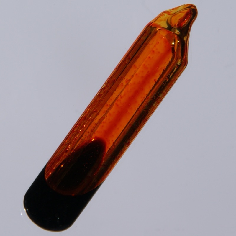 Bromine — 99.5 % pure liquid Bromine in a 4 x 1 cm big glass ampoule, cast in acrylic