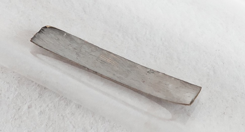 Technetium — Technetium Sample inside a sealed glass ampoule, filled with argon gas. 6x1 mm goldfoil covered with 99Tc powder (electroplated).