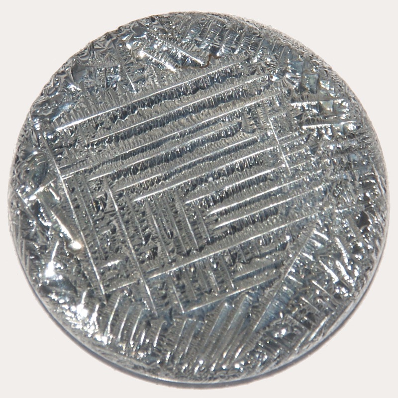 Tellurium — Metallic tellurium, diameter 3.5 cm