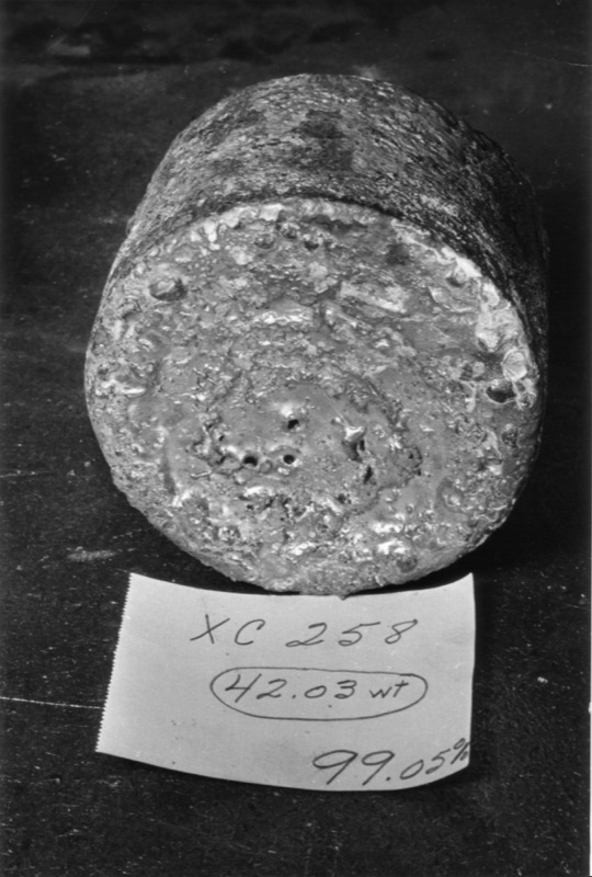 Uranium — A biscuit of uranium metal after reduction via the Ames Process. c.1943.